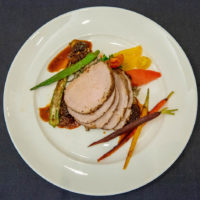 Bronze Medal Winner - St. Jude Children's Research Hospital Pan Roasted Pork Loin with Morels, Heirloom Tomatoes, Charred Summer Vegetables and Wild Rice and Corn Spaetzle